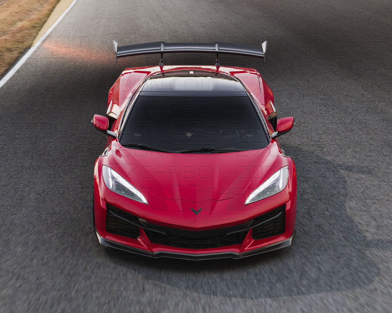 Front view of Corvette C8 Z06 ERAY ZR1 with aerodynamic fender vents on race track