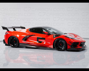 Side view of a red Chevrolet Corvette C8 ZR1 Stingray with a carbon fiber spoiler, displayed on a reflective white surface