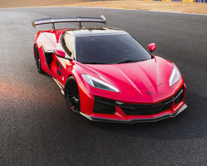 Front-side view of Corvette C8 Z06 ERAY ZR1 with carbon fiber spoiler on race track