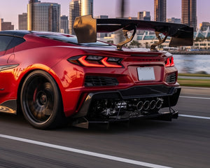 Corvette C8 Apex GT3 100% Pre-Preg Carbon Fiber Rear Diffuser installed on red C8 Corvette