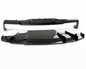 Uninstalled Corvette C8 Apex GT3 carbon fiber rear diffuser kit showing multi-piece assembly