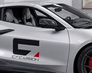 Silver C8 Corvette featuring C7 Carbon fiber mirror covers and side accents