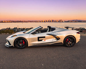 Full side profile of silver C8 Corvette convertible showing 5VM carbon fiber side skirt rocker panels
