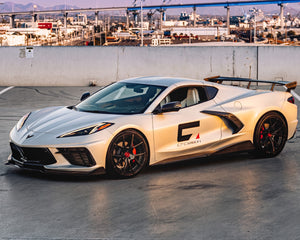 Front three quarter view of silver C8 Corvette showing 5VM carbon side skirt winglet and front splitter