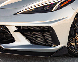 C8 Corvette front bumper carbon fiber grille bezels installed on silver Stingray