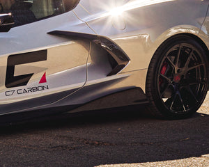 Low angle view of C8 Corvette side intake boomerang trim and carbon fiber exterior accents