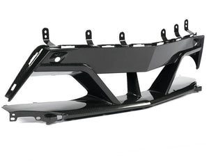Close-up view of functional airflow channels and brake duct routing on C8 carbon front center bezel