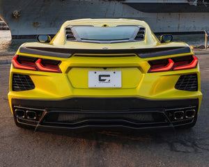 Direct rear view of yellow C8 Corvette with low profile carbon fiber decklid spoiler