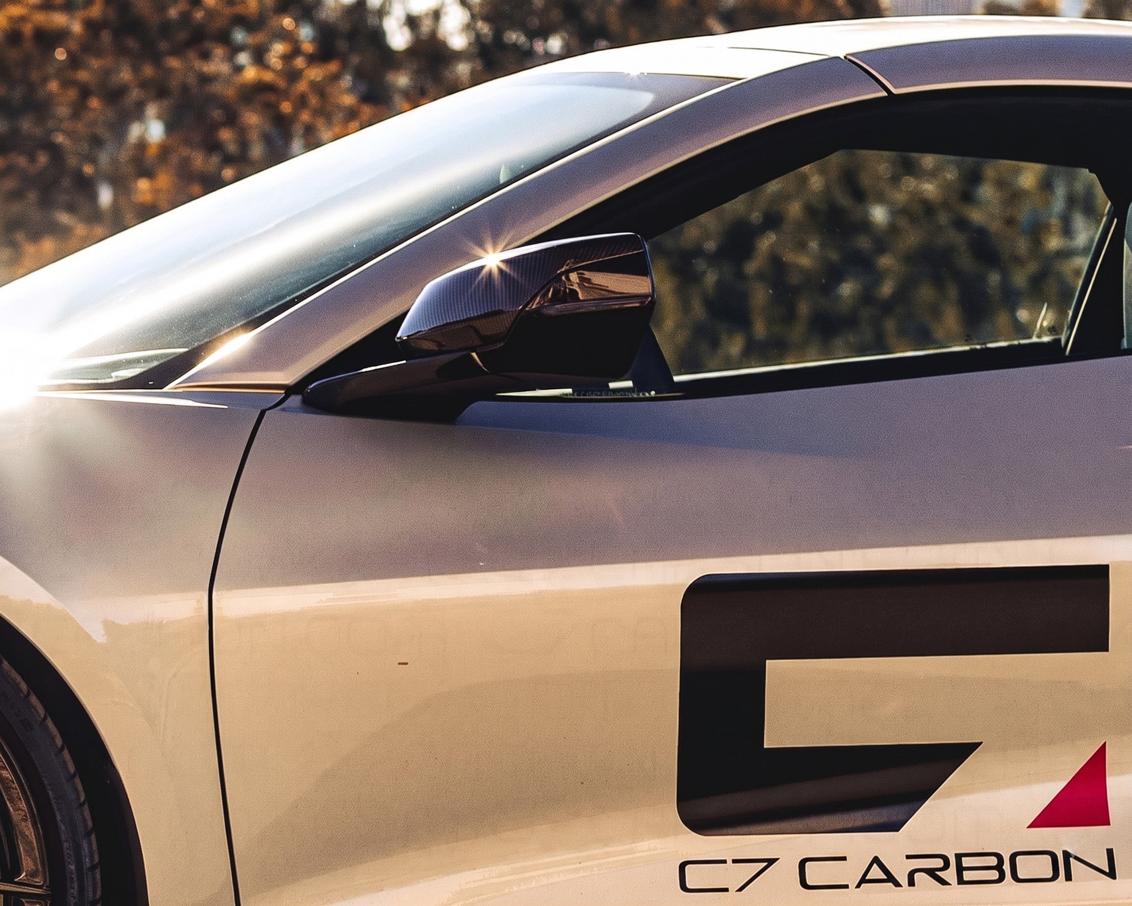 Close up view of pre-preg carbon fiber mirror cap installed on C8 Corvette