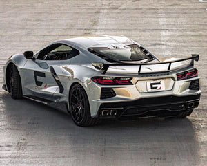 Rear three quarter view of C8 Corvette showing pre-preg carbon fiber OEM high wing spoiler