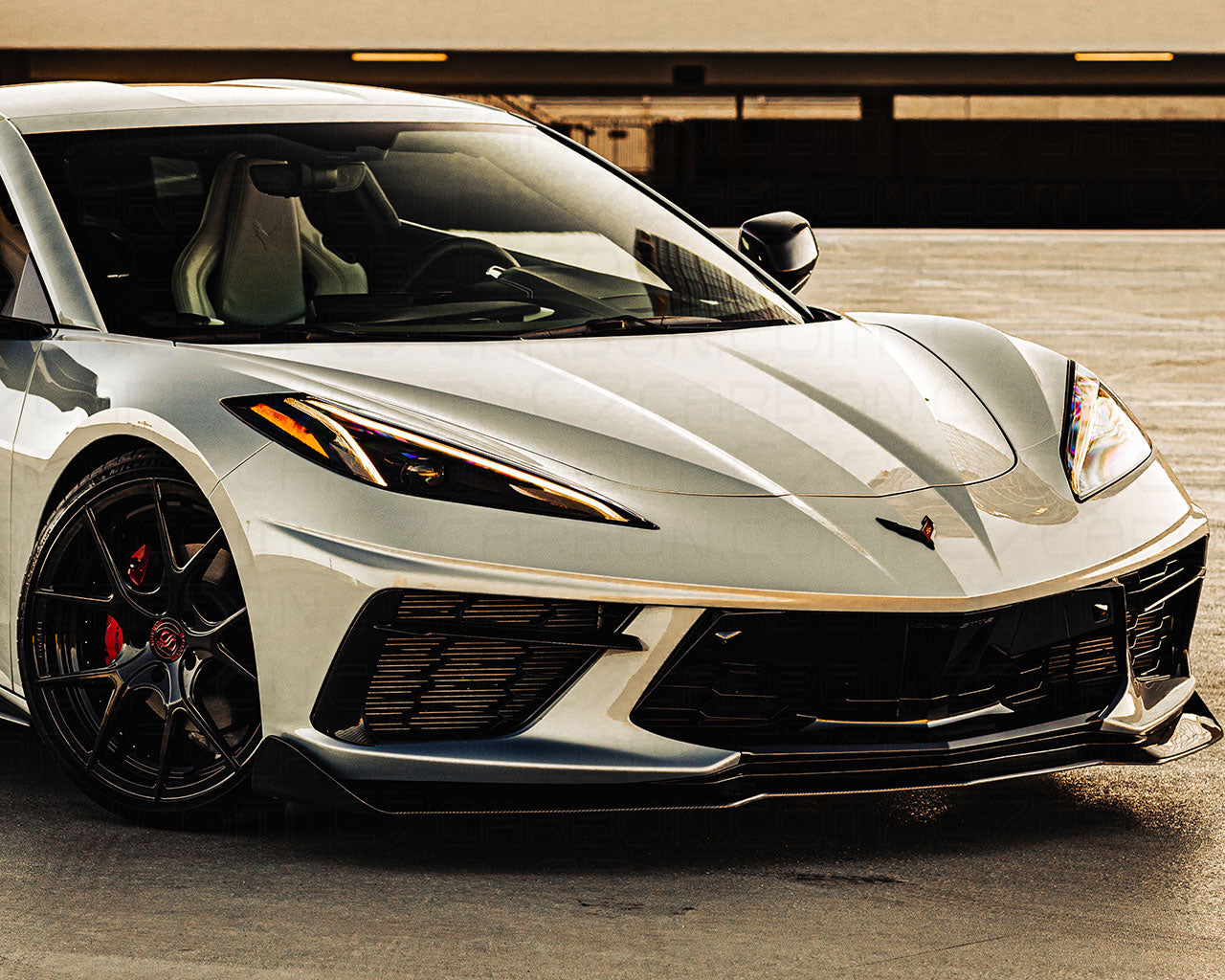 C7 Carbon 5VM style front splitter lip installed on Chevrolet Corvette C8 Stingray