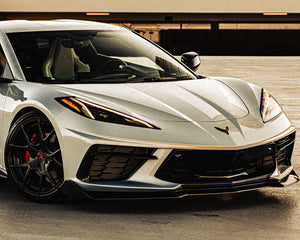 C7 Carbon 5VM style front splitter lip installed on Chevrolet Corvette C8 Stingray