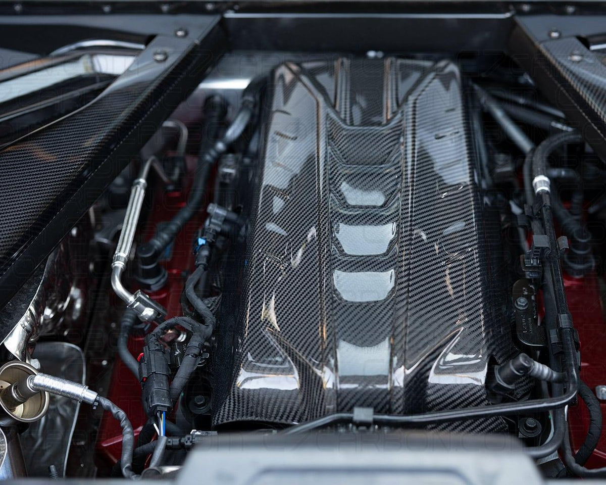 Close up view of carbon fiber engine cover installed on 2020+ C8 Corvette Stingray coupe