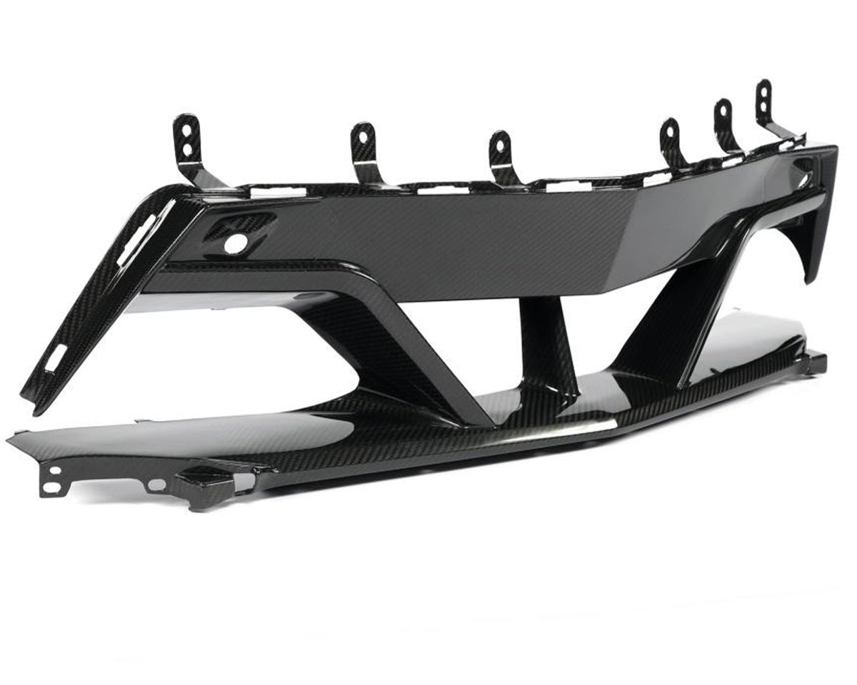 Close-up view of functional airflow channels and brake duct routing on C8 carbon front center bezel