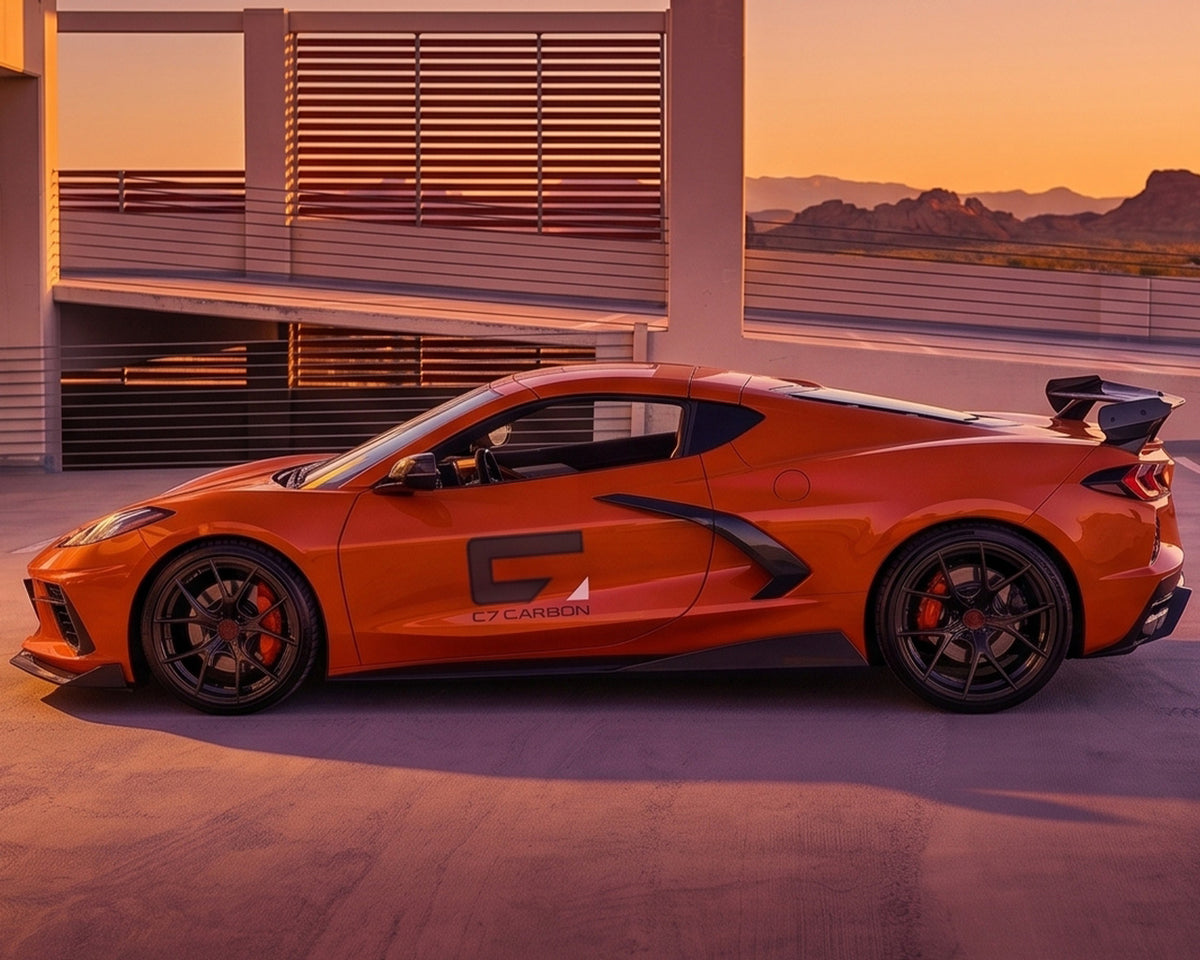 Full side profile angle of red C8 Corvette Stingray showing performance high wing aerodynamic lines