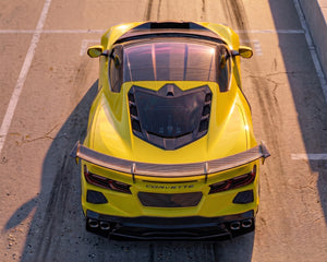 Direct overhead rear view of yellow C8 Corvette showing carbon fiber ZR1 style decklid spoiler