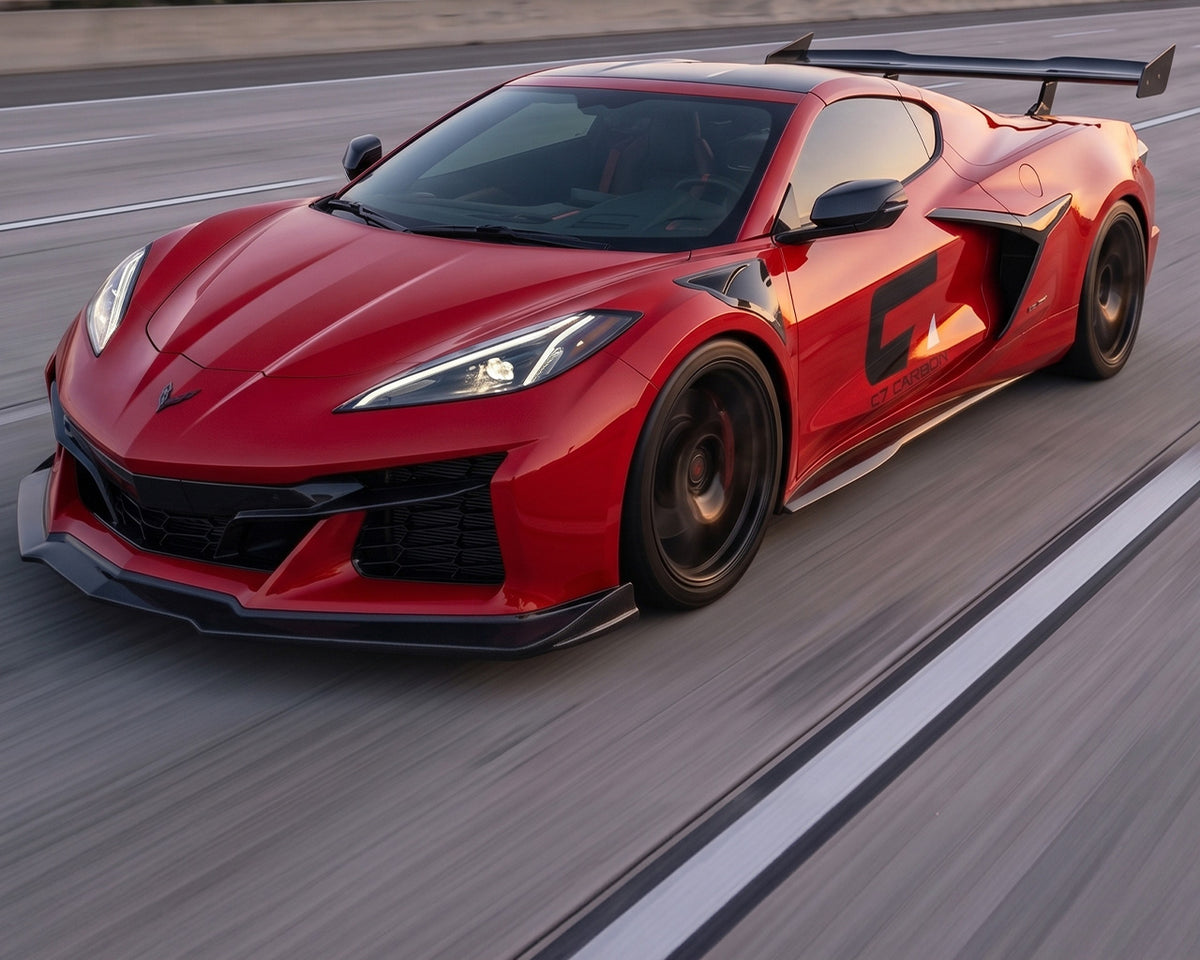 High angle driving view of widebody Corvette C8 Z06 E-Ray with aerodynamic carbon side splitters