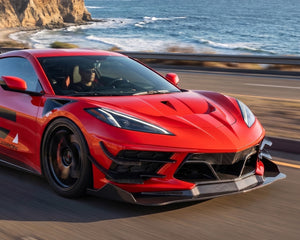 Torch Red C8 Corvette Driving Along Coastal Highway with Functional Carbon Fiber S-Duct Hood | C7 Carbon