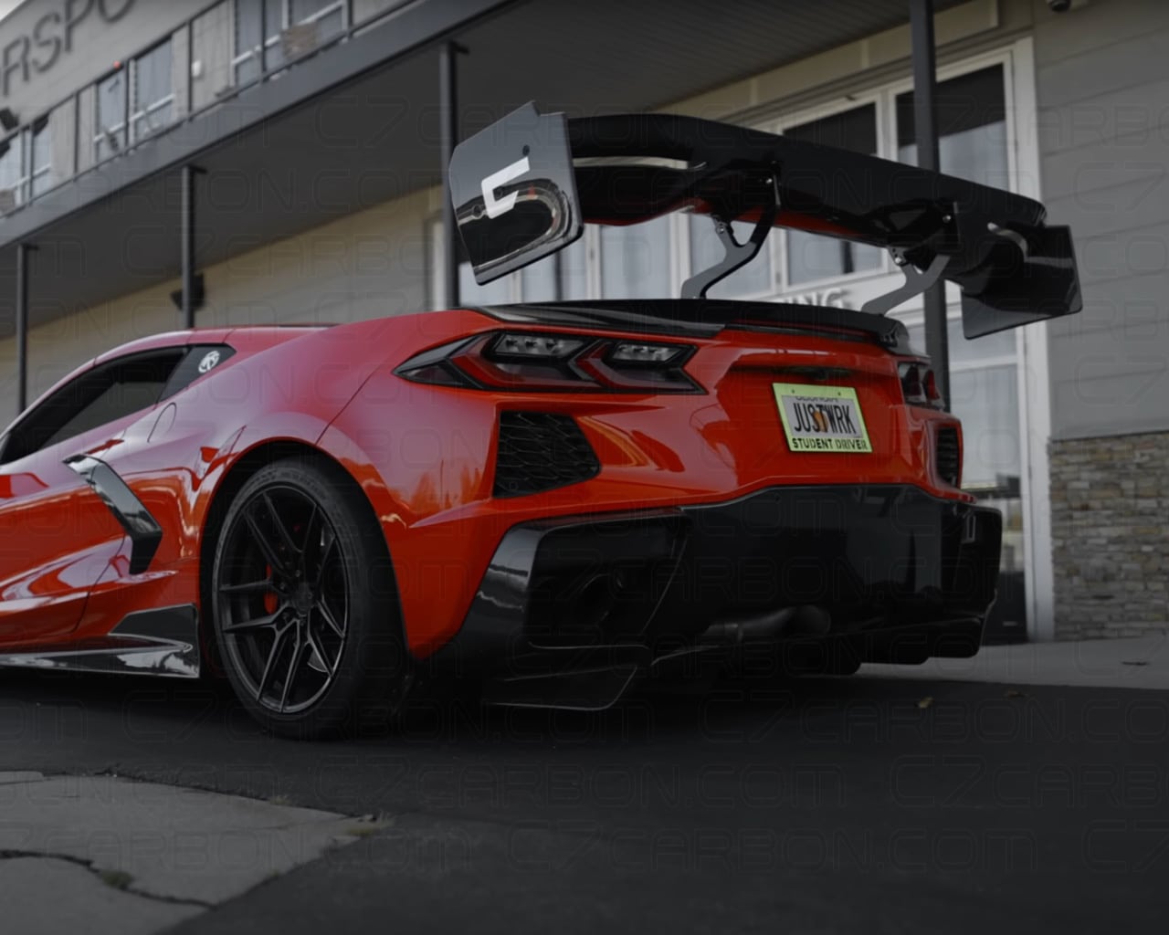 C8 Corvette Victory Spoiler installed red Stingray rear angle C7 Carbon