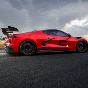 Side profile view of a red Chevrolet Corvette C8 ZR1 Stingray on a race track, equipped with a black carbon fiber rear spoiler